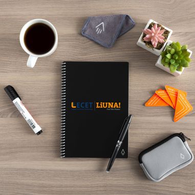 LiUNA! LECET branded spiral notebook on a desk